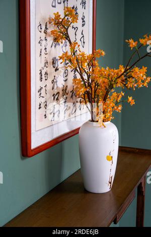 Chinese calligraphy background wall and illustration vase for interior design Stock Photo