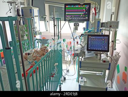 child patient in hospital intensive care ward., France Stock Photo