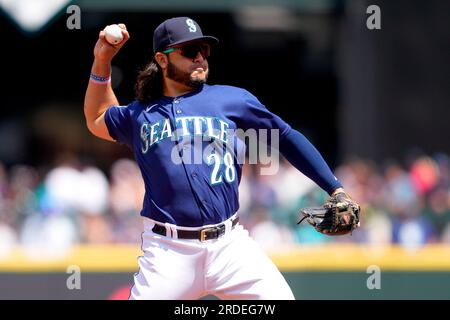 Seattle Mariners third baseman Eugenio Suarez can't make a play against the  New York Yankees in a baseball game Monday, May 29, 2023, in Seattle. (AP  Photo/Lindsey Wasson Stock Photo - Alamy