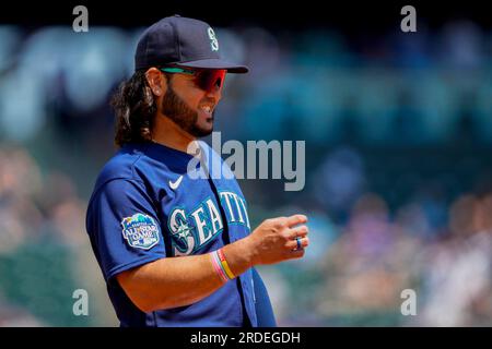 Seattle Mariners third baseman Eugenio Suarez makes a throw after fielding  a ground ball against the St. Louis Cardinals during a baseball game,  Saturday, April 22, 2023, in Seattle. (AP Photo/John Froschauer