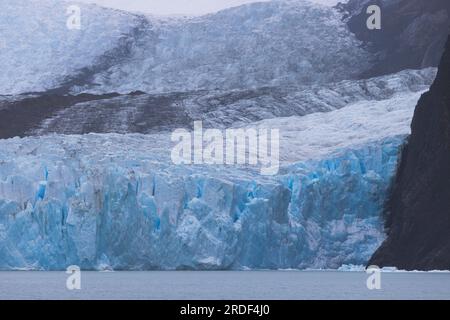 cracks and blues in the front of a glacier Stock Photo