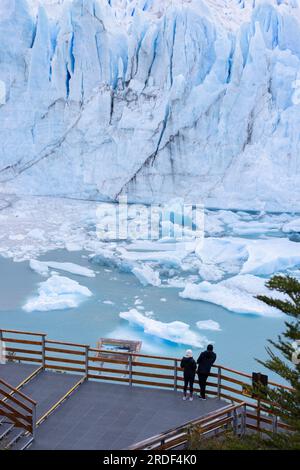 people observe cracks and blues of the perito moreno glacier Stock Photo