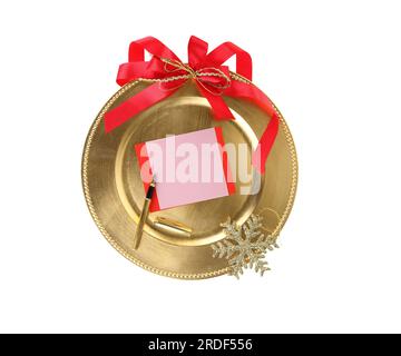 Christmas Greeting card template. Empty paper note in a gold plate isolated on white Stock Photo