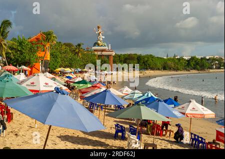 A sunny day on the beach at Kuta Beach, Bali, Indonesia Stock Photo