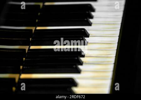 Image of black and white keys of an old grand piano Stock Photo