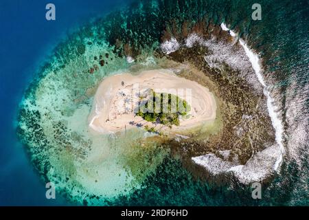 Aerial view of isolated island in remote french polynesia Stock Photo