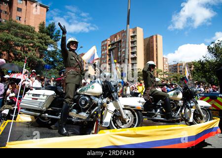 Colombian police officers parade in with classic Colombian police Harley Davidson motorcycles oduring the military parade for the 213 years of Colombi Stock Photo