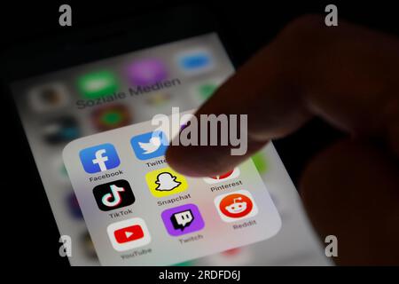 Social media icon, detailed view of a smartphone with social media apps, Facebook, Twitter, Instagram, Tik Tok, Snapchat, Pinterest, YouTube, Twitch Stock Photo