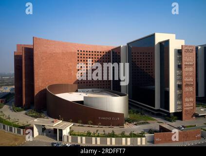 Aerial view with Diamond Club entrance. Surat Diamond Bourse, Surat, India. Architect: Morphogenesis , 2023. Stock Photo