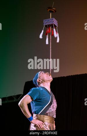 Japanese Circus artist performing at MERCANTIA International Street Theater Festival. Stock Photo