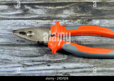 Electricity Pliers, an important tool for electricians, useful when working with electrical wire, essential and are used to cut, straighten, twist, an Stock Photo