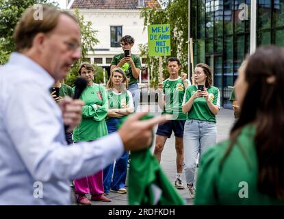 AMERSFOORT - CEO Jan Derck van Karnebeek of FrieslandCampina is talking to demonstrators from Milieudefensie Jong in front of the dairy company's head office. The youth organization wants an answer to the question of whether FrieslandCampina intends to reduce its CO2 emissions in line with the Paris Climate Agreement. ANP SEM VAN DER WAL netherlands out - belgium out Stock Photo