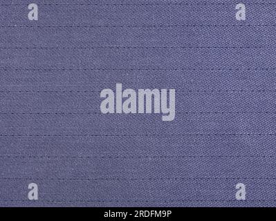 Elegant fabric texture as background. wool suit fabric texture. Purple plain weave suiting fabric with a sheen. The texture of the fabric. Light lilac Stock Photo