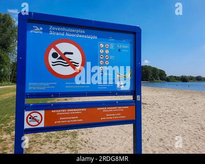 Warning signs at Zevenhuizerplas for Zwemmersjeuk (Swimmer's itch, also called cercarial dermatitis) during summer Stock Photo