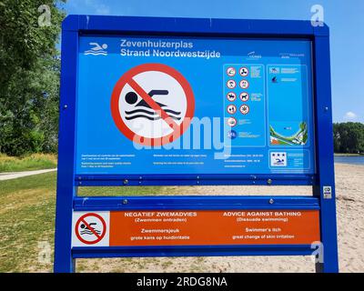 Warning signs at Zevenhuizerplas for Zwemmersjeuk (Swimmer's itch, also called cercarial dermatitis) during summer Stock Photo