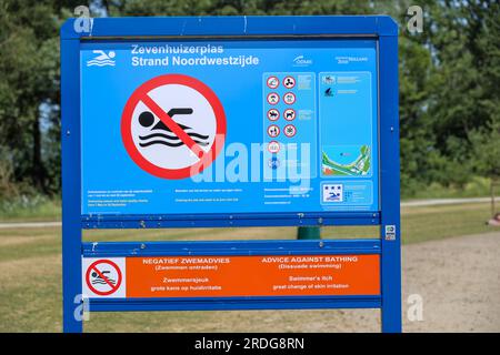 Warning signs at Zevenhuizerplas for Zwemmersjeuk (Swimmer's itch, also called cercarial dermatitis) during summer Stock Photo