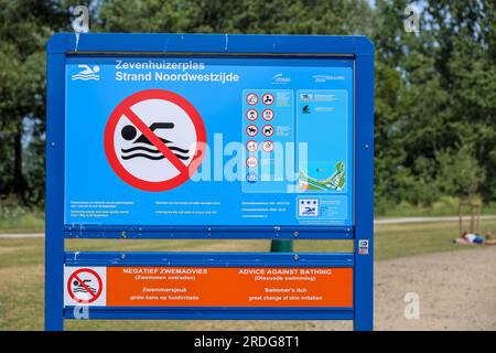 Warning signs at Zevenhuizerplas for Zwemmersjeuk (Swimmer's itch, also called cercarial dermatitis) during summer Stock Photo