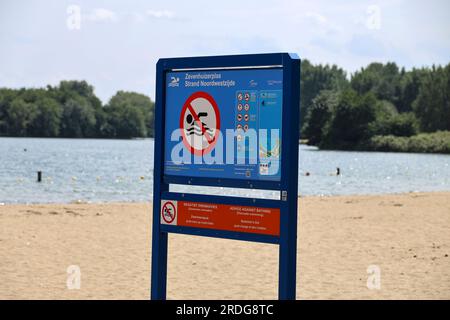 Warning signs at Zevenhuizerplas for Zwemmersjeuk (Swimmer's itch, also called cercarial dermatitis) during summer Stock Photo