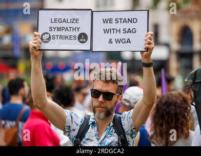 London, UK. 21st July, 2023. Equity rally in solidarity with SAG-AFTRA members. Actors, writers and Equity members gather in Leicester Sqaure, London, under the statue of William Shakespeare. Credit: Mark Thomas/Alamy Live News Stock Photo