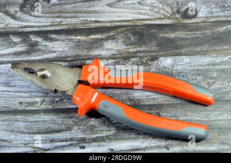 Electricity Pliers, an important tool for electricians, useful when working with electrical wire, essential and are used to cut, straighten, twist, an Stock Photo