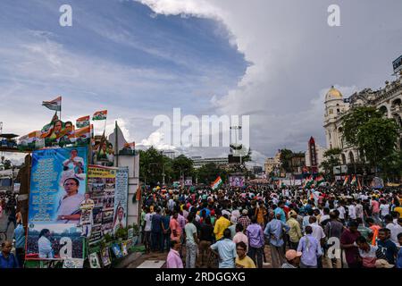 Kolkata, India. 21st July, 2023. Trinamool Congress party supporters participate in the mega Annual Martyrs Day program at the Esplanade area. Trinamool Congress party held the Annual Martyrs Day rally, TMC's biggest annual political event drawing massive crowd from all over the state to Esplanade area, the heart of Kolkata on every 21st July to commemorate the 13 people who were shot died by West Bengal police on 21st July 1993 during a rally held by then. (Photo by Dipayan Bose/SOPA images/Sipa USA) Credit: Sipa USA/Alamy Live News Stock Photo