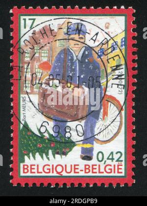 RUSSIA KALININGRAD, 26 OCTOBER 2015: stamp printed by Belgium, shows mailman, circa 2000 Stock Photo