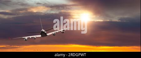 Passanger plane flying. Airliner in the sky Stock Photo - Alamy