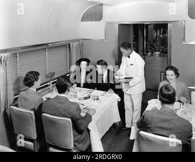United States:  c. 1938 The dining car on the Chicago, Burlington & Quincy's (CB&Q) new stainless steel Denver Zephyr, which ran between Chicago and Denver. Stock Photo