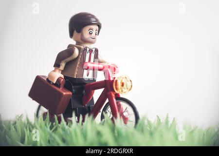 To work by bike. Business concept. Illustrative editorial. July 30, 2023 Stock Photo