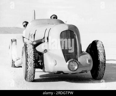 Bonneville Salt Flats, Utah:  August 1, 1935 Race car driver Ab Jenkins as he starts our on a test run in his attempt to set new land speed records in his 700 horsepower race car. Stock Photo