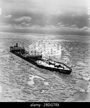 Canada: November, 1969 The SS Manhattan, an oil tanker outfitted with an  icebreaker bow, as she crosses the Northwest Passage in the Arctic. The  ship is 1005 feet long, and its beam