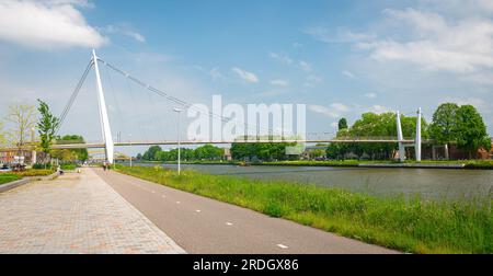 Bicycle and pedestrian bridge (Dafne Schippersbrug) over the Amsterdam-Rijnkanaal in Utrecht, The Netherlands Stock Photo