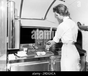 Washington, D.C.:  June, 1954 A Trailways Bus Line hostess working on the new Five Star Service between Washington and Norfolk. Stock Photo
