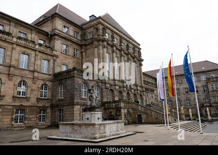 Kassel, Germany. 21st July, 2023. Flags fly in front of the city's town hall. In the evening, the new mayor Schoeller (Bündnis90/Grüne) is inaugurated. Credit: Swen Pförtner/dpa/Alamy Live News Stock Photo
