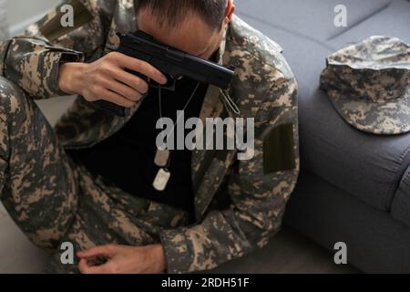 Portrait of middle aged sad, desperate military man. Disabled soldier suffering from depression psychological trauma. PTSD concept. Stock Photo