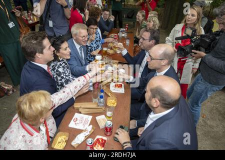 Brussels, Belgium. 21st July, 2023. The Federal Ministers gather for a lunch where members of the federal government eat fries with partners and children at the Warandepark - Parc de Bruxelles, on the Belgian National Day, in Brussels, Friday 21 July 2023. BELGA PHOTO NICOLAS MAETERLINCK Credit: Belga News Agency/Alamy Live News Stock Photo
