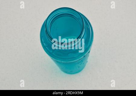 Blue water bottle close-up, representing commitment to health and vitality. Hydrate to reach your goals. Stock Photo