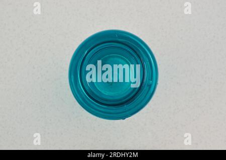 Closeup of a blue water bottle, symbol of health and vitality. Stay hydrated during physical activities. Stock Photo