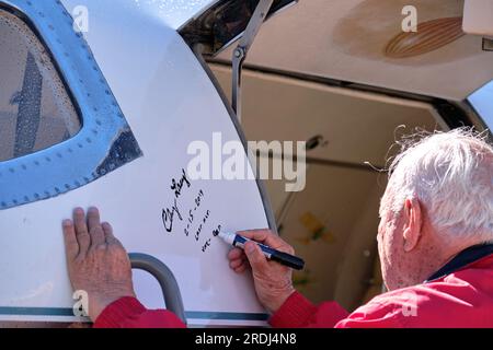 Palm Springs, California, USA. 16th Feb, 2019. Aviation icon, Clay Lacy autographing Learjet N464CL famous for flying countless move stars, rock stars and dignitaries. The aircraft being retired to the Palm Springs Air Museum. (Credit Image: © Ian L. Sitren/ZUMA Press Wire) EDITORIAL USAGE ONLY! Not for Commercial USAGE! Stock Photo