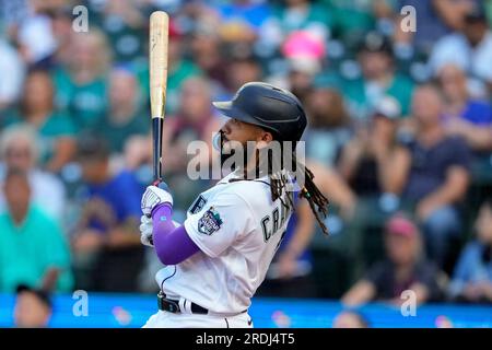 Seattle Mariners' J.P. Crawford follows through on a swing during