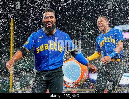 Seattle Mariners Teoscar Hernandez swings through while batting against the  Colorado Rockies during the third inning of a baseball game, Friday, April  14, 2023, in Seattle. (AP Photo/John Froschauer Stock Photo - Alamy