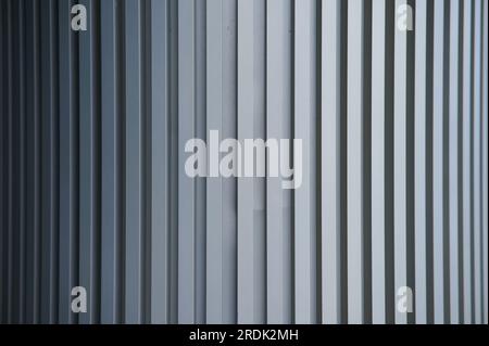 Pattern from corrugated metal column Stock Photo