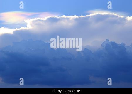 Clouds that float in alternating layers, similar to water coloring. Stock Photo