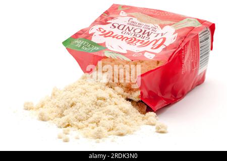 150g Bag of Whitworths Ground Almonds in a Recyclable Packet Spilling onto a White Surface Stock Photo