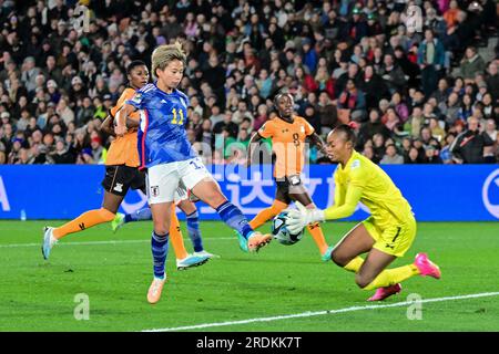 Hamilton, New Zealand. 22nd July, 2023. Tanaka Mina (L) of Japan shoots during the group C match between Zambia and Japan at the FIFA Women's World Cup in Hamilton, New Zealand, July 22, 2023. Credit: Zhu Wei/Xinhua/Alamy Live News Stock Photo