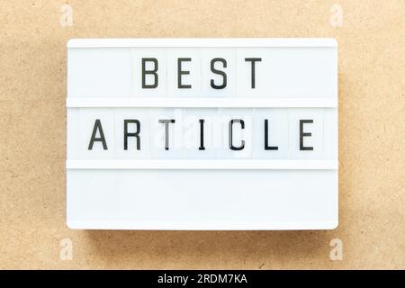 Lightbox with word best article on wood background Stock Photo