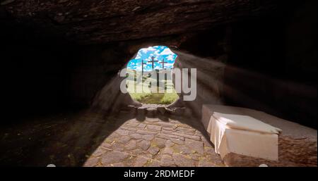 Jesus Christ resurrection the stone is rolled away from the grave and the light comes in. Three crosses on the hill from inside the tomb. Easter conce Stock Photo
