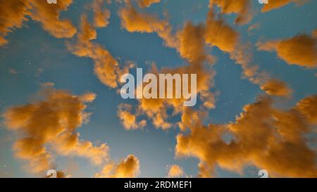 golden clouds on the starry sky in the morning or evening. Cloudy sky. Beautiful cloudscape Stock Photo