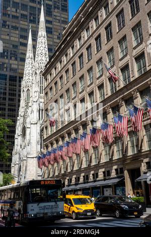 American Flags on facade of Saks Fifth Avenue, New York City , USA  2023 Stock Photo