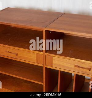 Vintage teak media console. Mid-Century Modern record storage cabinet. Stock Photo